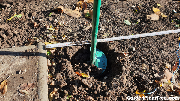 Digging-holes-with-garden-auger