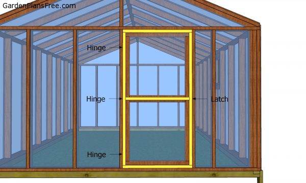 Fitting the door to the greenhouse